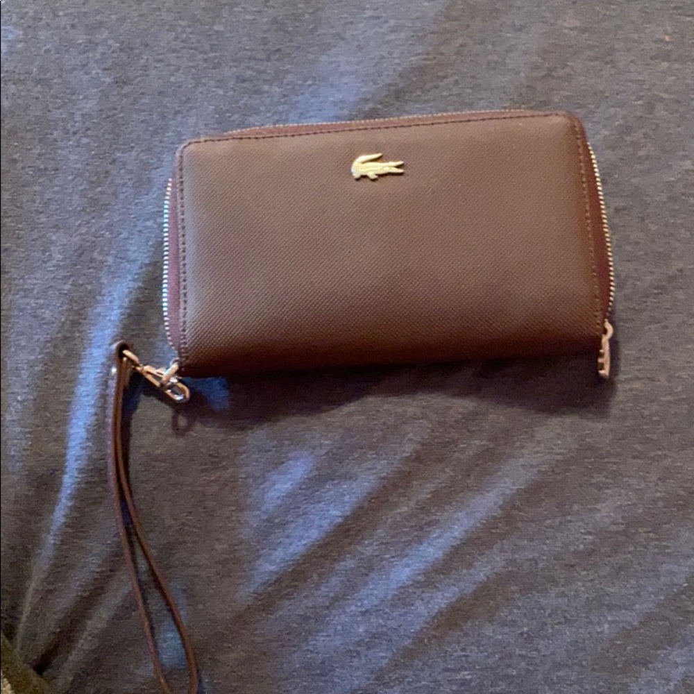 Lacoste purple wristlet